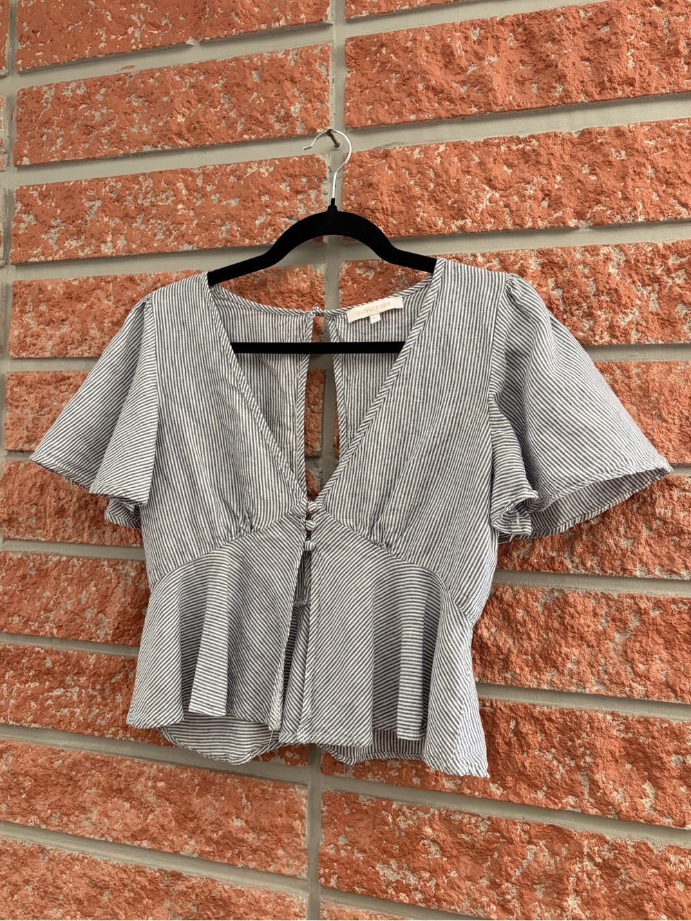 🌟 Olivaceous Black and White Striped V-Neck Peplum Blouse